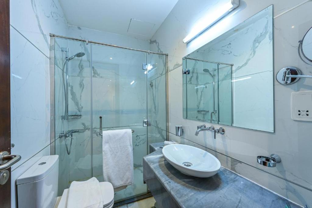 Al Mansour Suites Hotel Doha Exterior foto